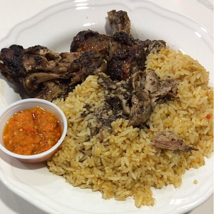 Fried rice with jerk chicken at Liberian Cuisine Bar and Grill in Edmonton, AB
