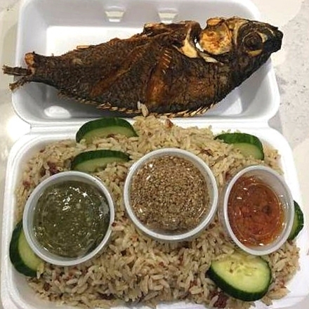 Liberian dry rice with fried fish at Liberian Cuisine Bar and Grill in Edmonton, AB